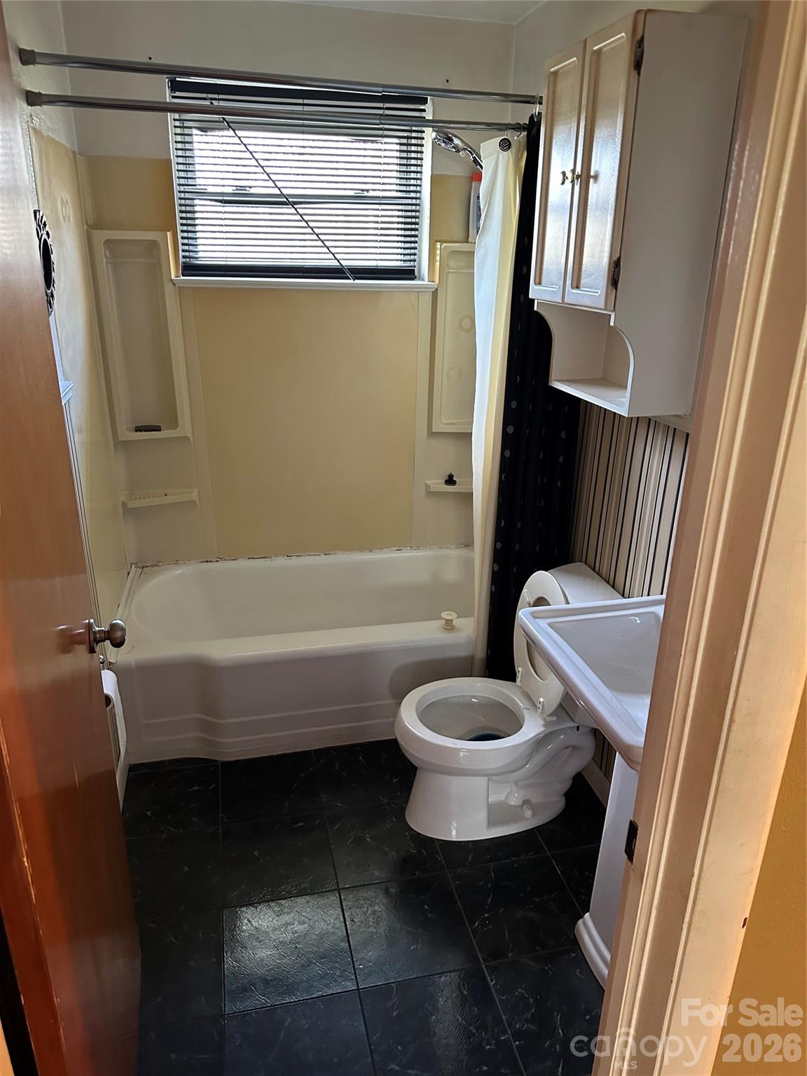5164 Lavern Street, Unit 1 Conover, NC 28613 - Photo 24 of 28 a bathroom with a toilet a sink and a bathtub