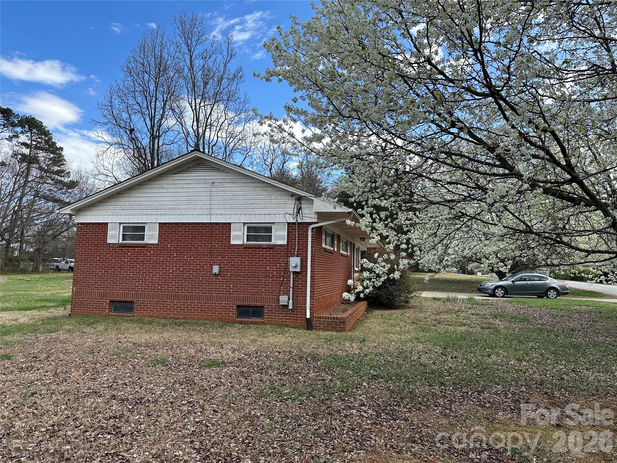 5164 Lavern Street, Unit 1 Conover, NC 28613 - Photo 10 of 28 a view of a house with a yard