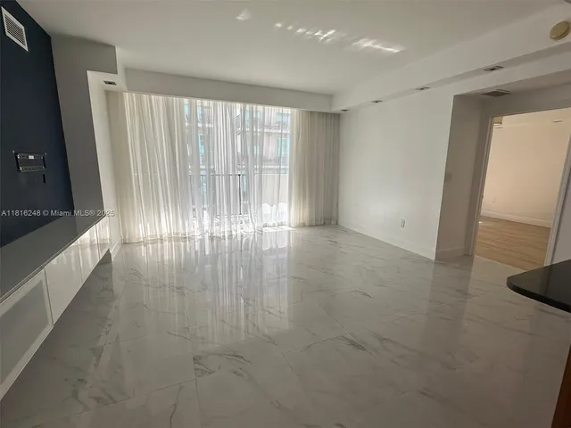 a view of entryway with stairs