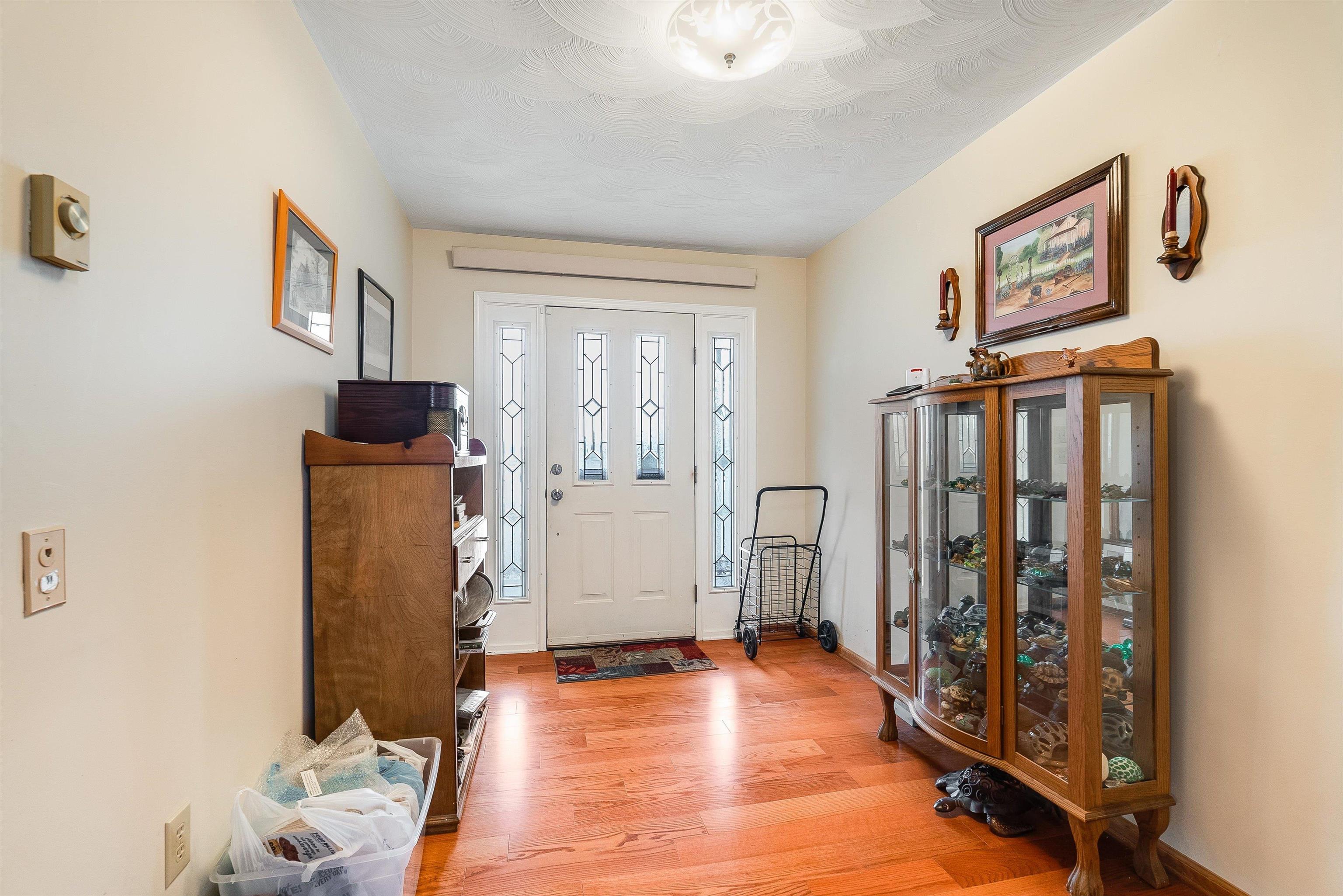 1577 Dam Town Road Fort Defiance, VA 24437 - Photo 5 of 68 a view of a livingroom with wooden floor and furniture