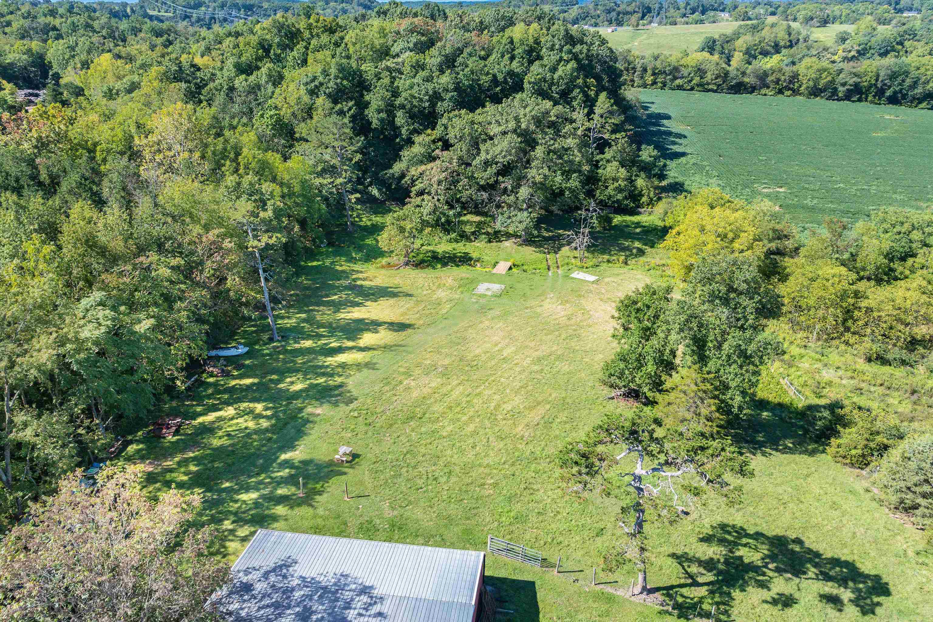 1577 Dam Town Road Fort Defiance, VA 24437 - Photo 59 of 68 a view of a garden with a lake