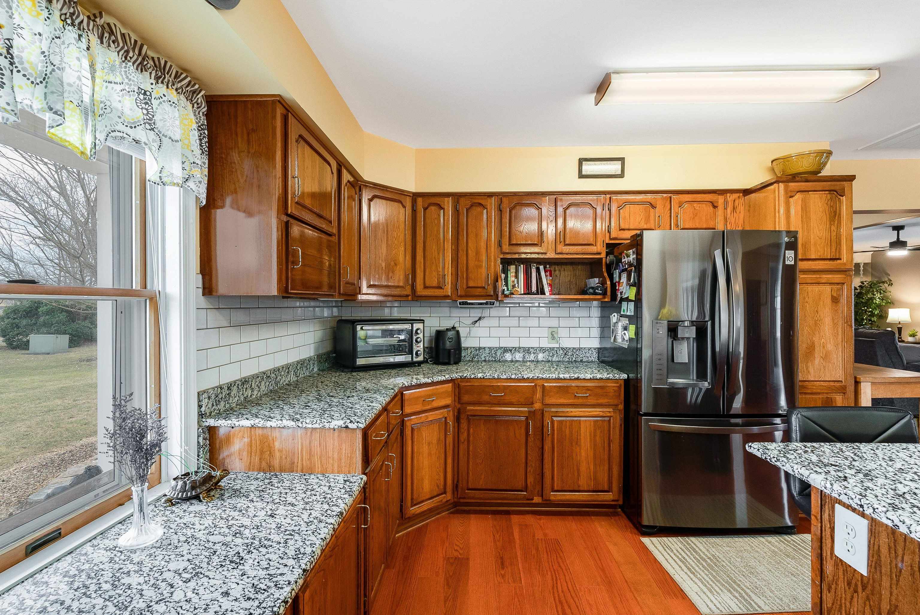 1577 Dam Town Road Fort Defiance, VA 24437 - Photo 8 of 68 a kitchen with stainless steel appliances granite countertop a refrigerator a stove and sink
