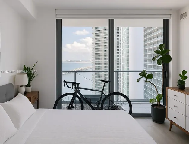 a living room with furniture potted plant and a window