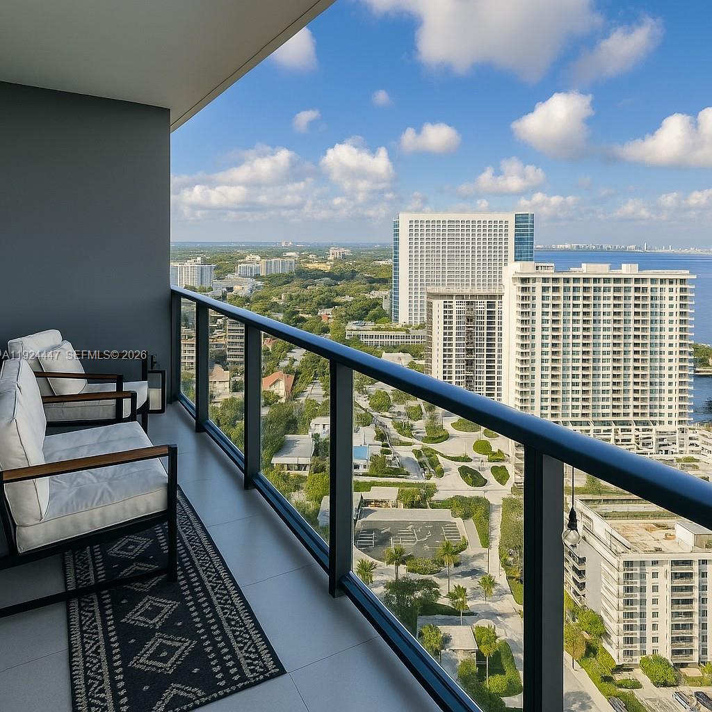 501 Northeast 31st Street, Unit 2902 Miami, FL 33137 - Photo 3 of 36 a view of a balcony with chairs