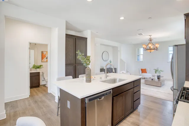 a view of living room with granite countertop furniture and fireplace