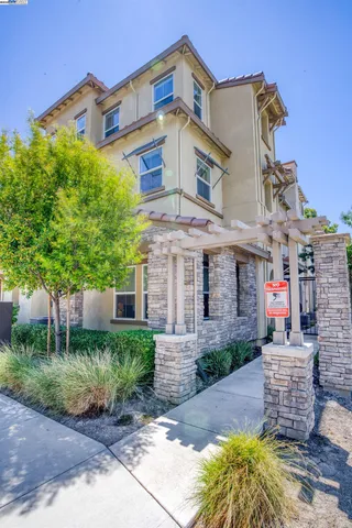 a front view of a building with garden