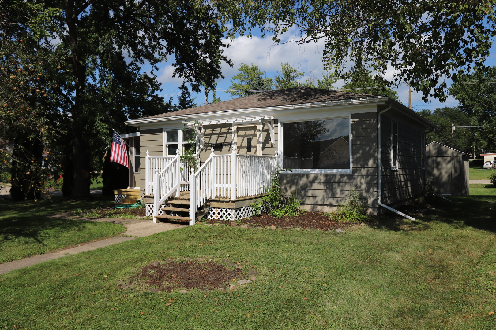 1103 Garfield Road Harvard, IL 60033 - Photo 1 of 28 a view of a house with a yard