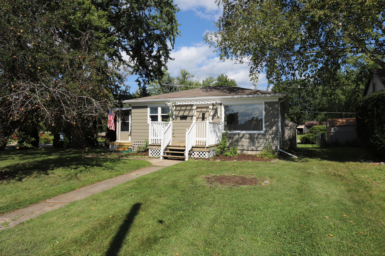 1103 Garfield Road Harvard, IL 60033 - Photo 13 of 28 a view of a house with backyard and a tree