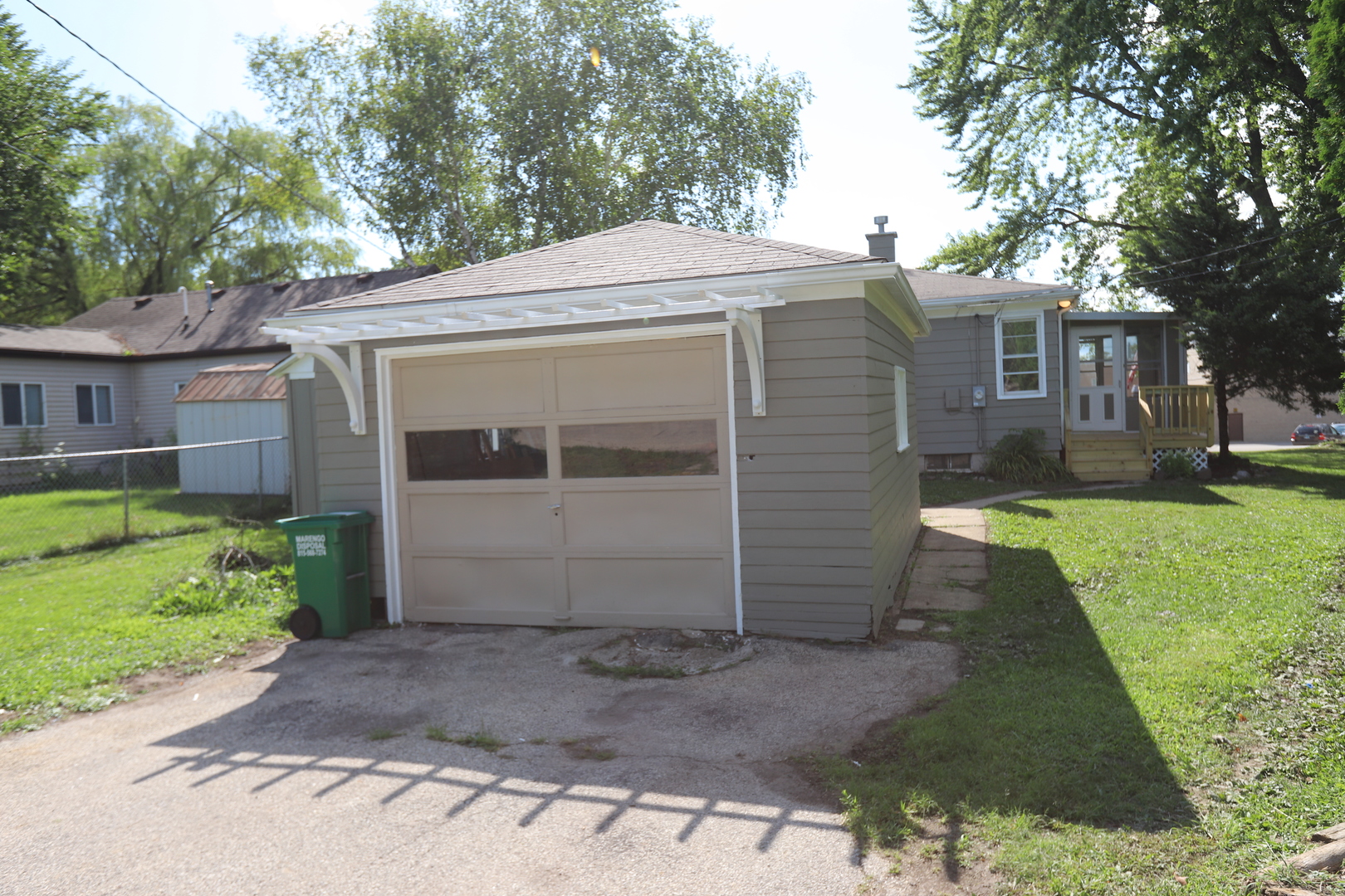 1103 Garfield Road Harvard, IL 60033 - Photo 19 of 28 a view of a house with a yard