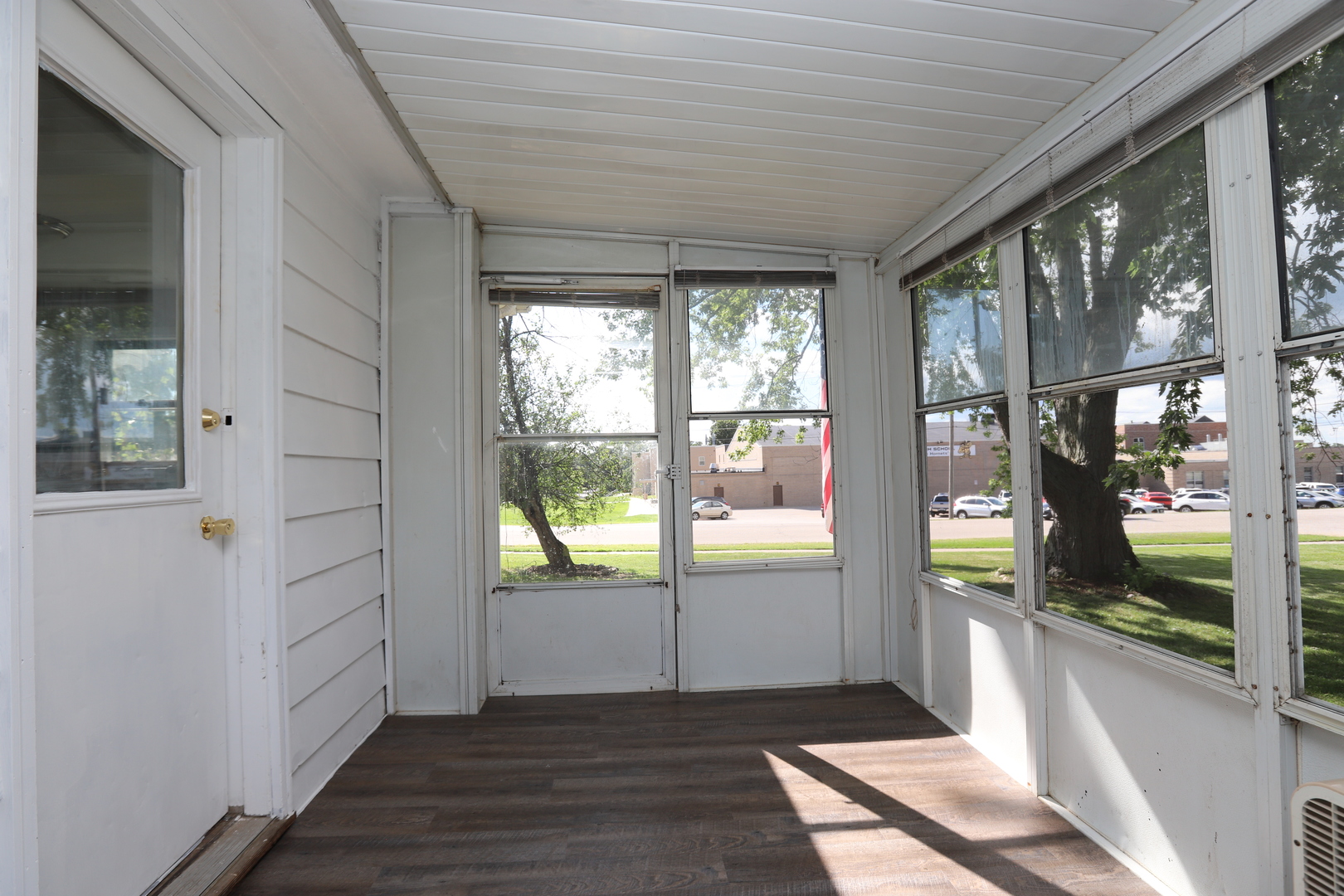 1103 Garfield Road Harvard, IL 60033 - Photo 21 of 28 a view of hallway with wooden floor and a window