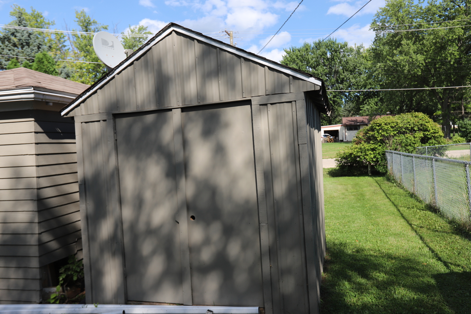 1103 Garfield Road Harvard, IL 60033 - Photo 25 of 28 a backyard of a house