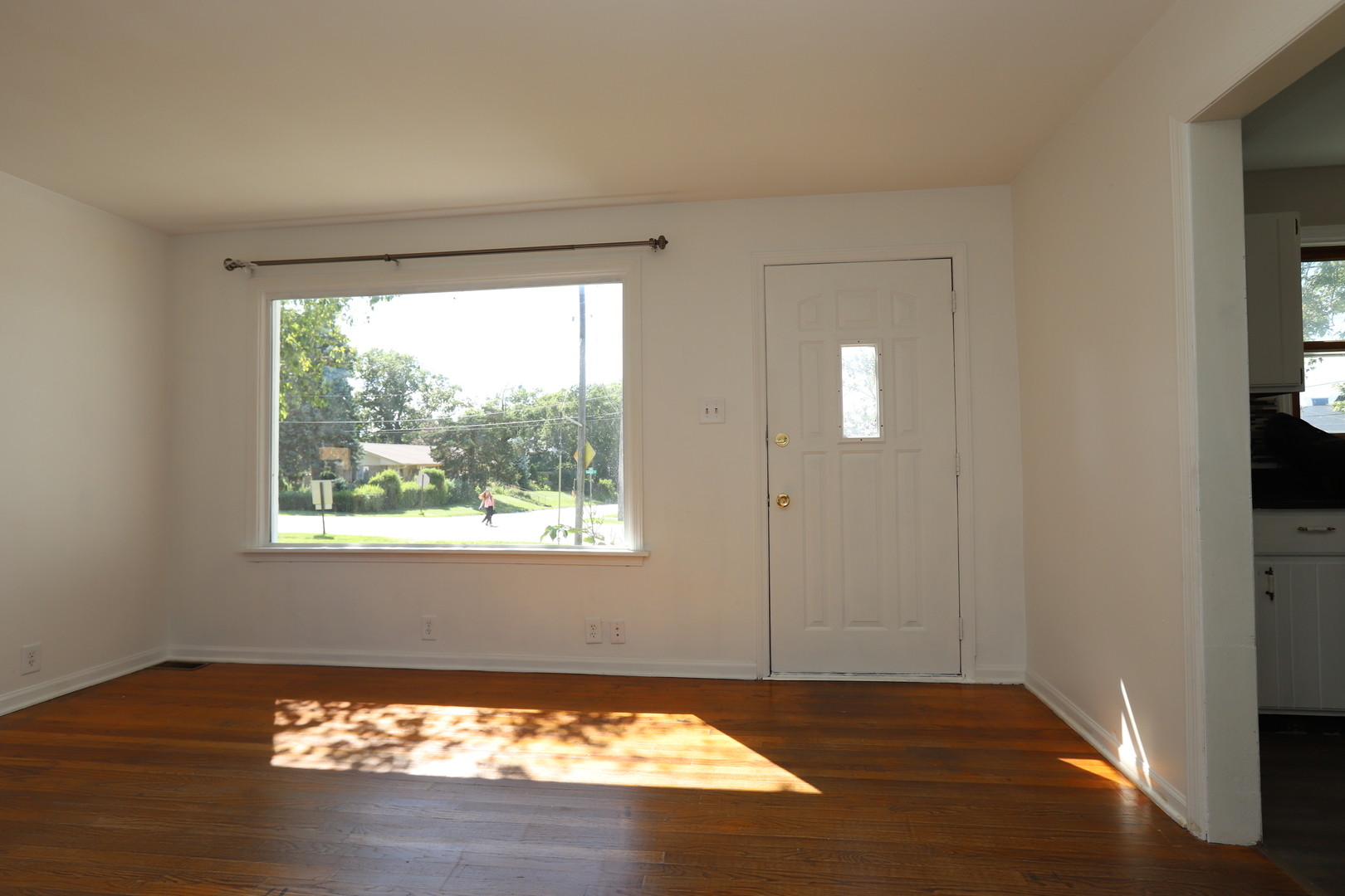 1103 Garfield Road Harvard, IL 60033 - Photo 5 of 28 a view of an empty room and window