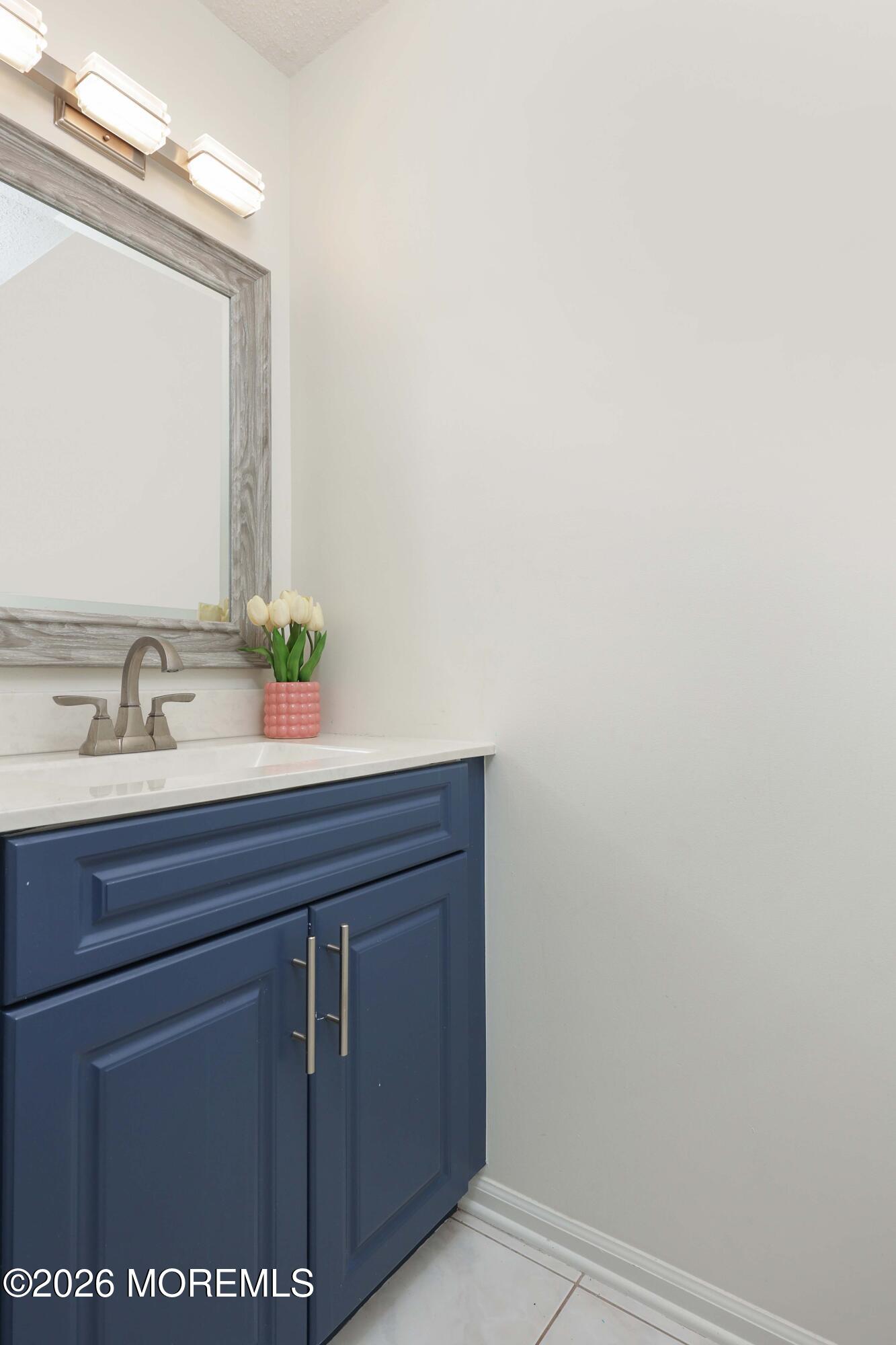 80 West Shenendoah Road Howell, NJ 07731 - Photo 12 of 34 a bathroom with a sink and a mirror