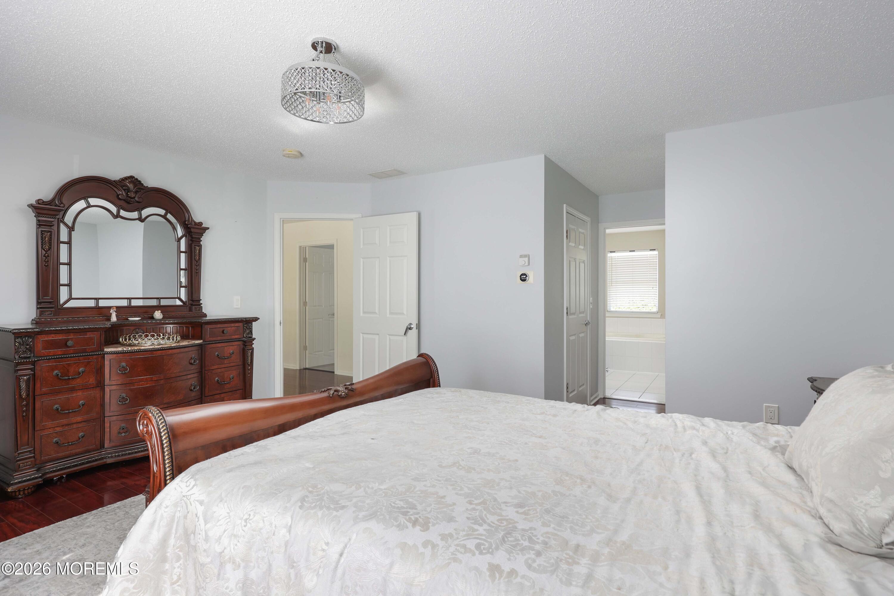 80 West Shenendoah Road Howell, NJ 07731 - Photo 17 of 34 a bedroom with a bed and a dresser