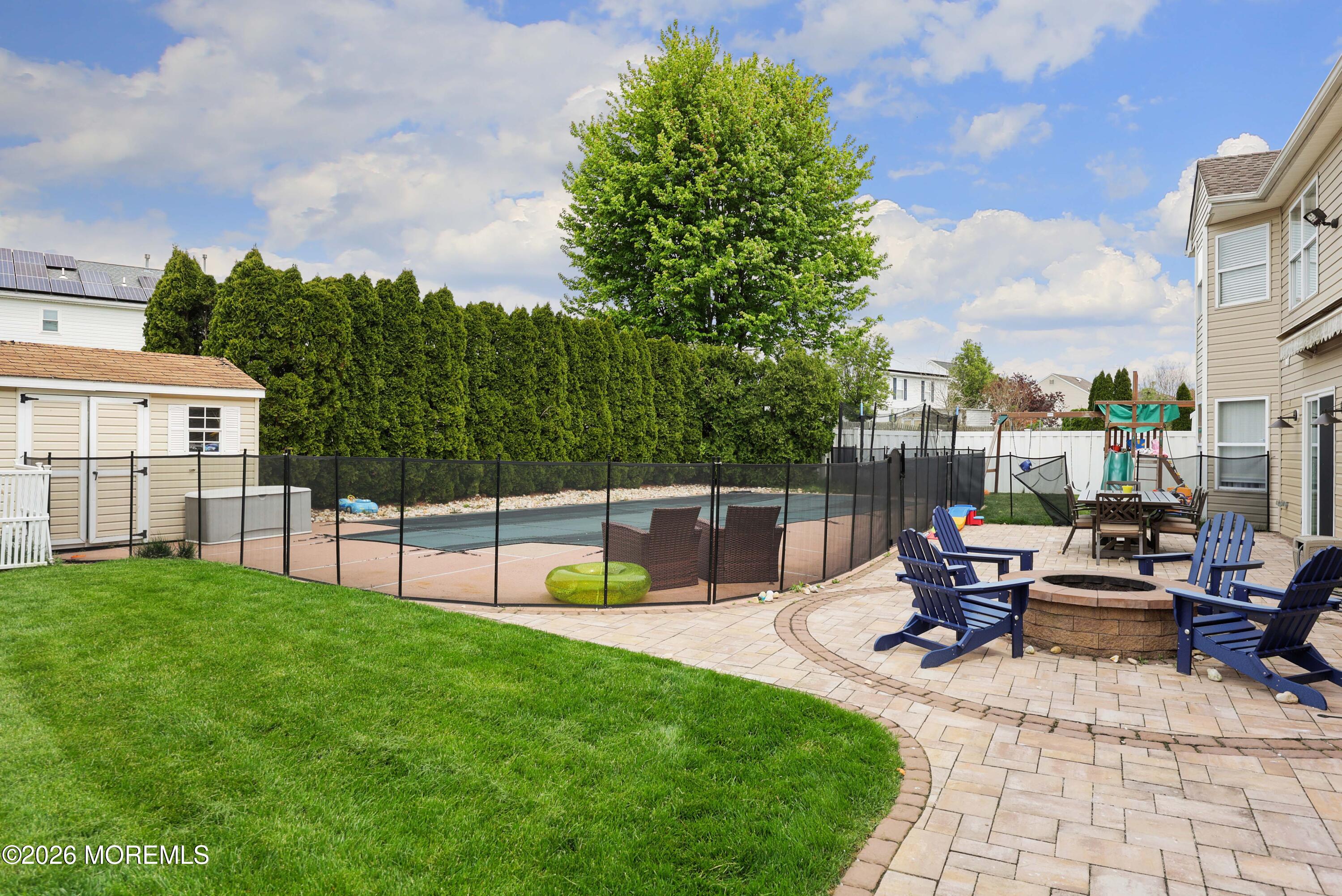 80 West Shenendoah Road Howell, NJ 07731 - Photo 25 of 34 a view of a backyard with sitting area