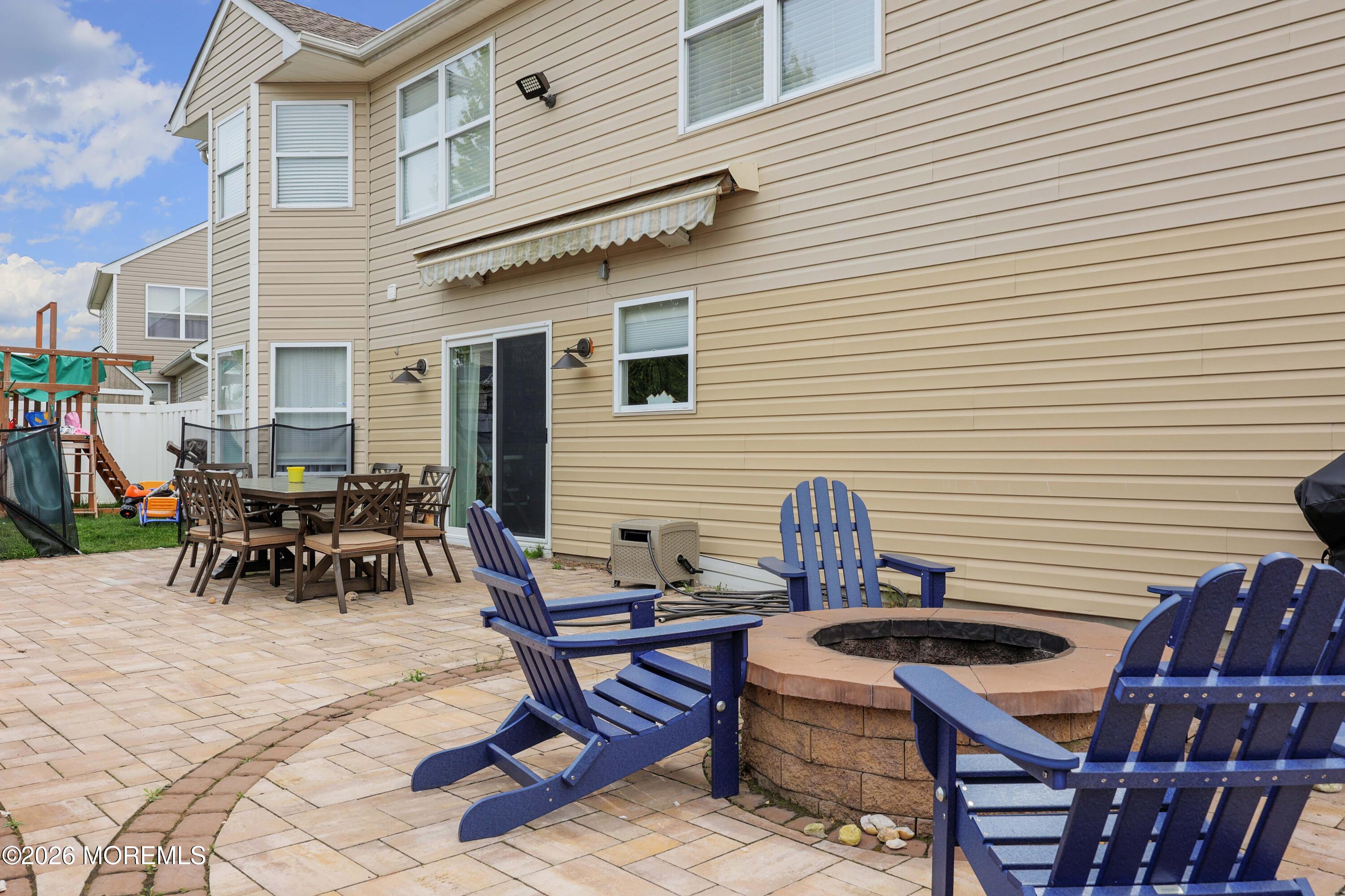 80 West Shenendoah Road Howell, NJ 07731 - Photo 27 of 34 a view of a patio with table and chairs