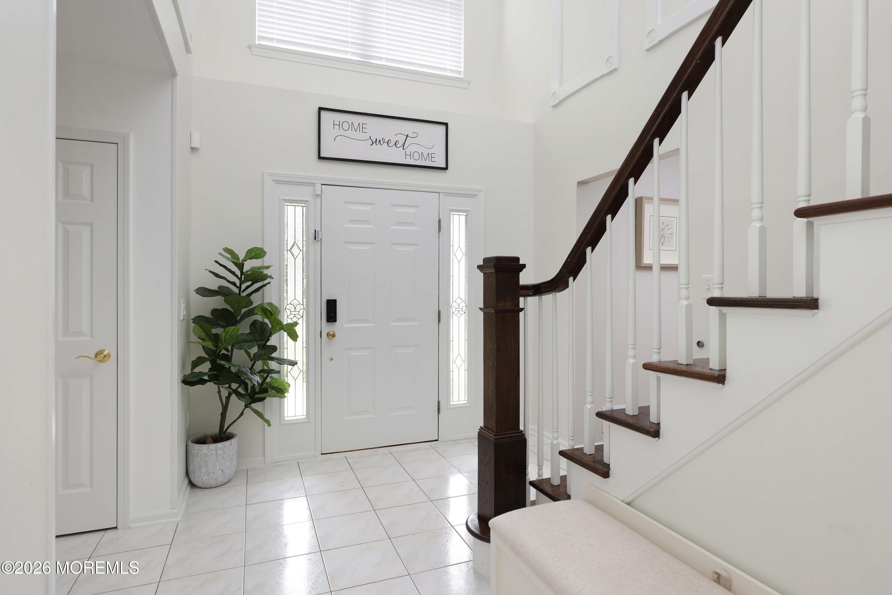 80 West Shenendoah Road Howell, NJ 07731 - Photo 4 of 34 a view of entryway with stairs
