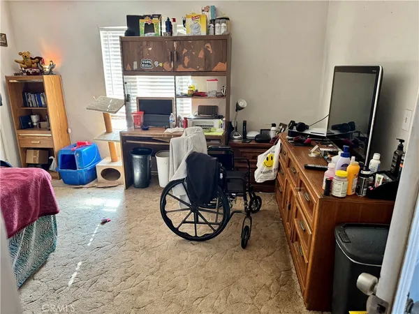a view of a hallway with windows