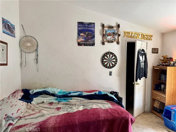 a spacious bathroom with a sink and a mirror
