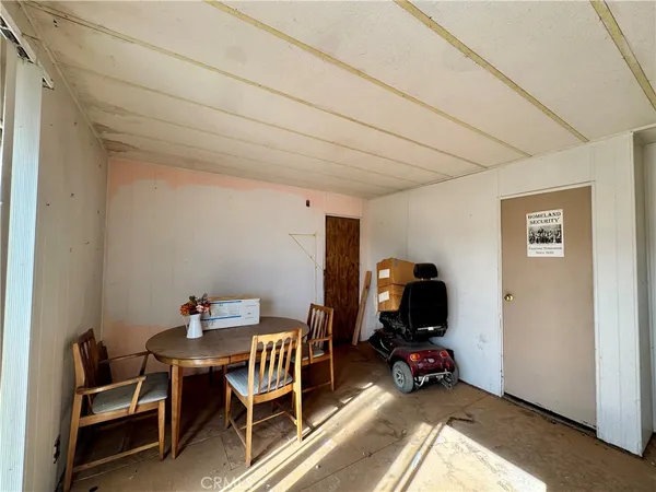 a view of a garage with chairs