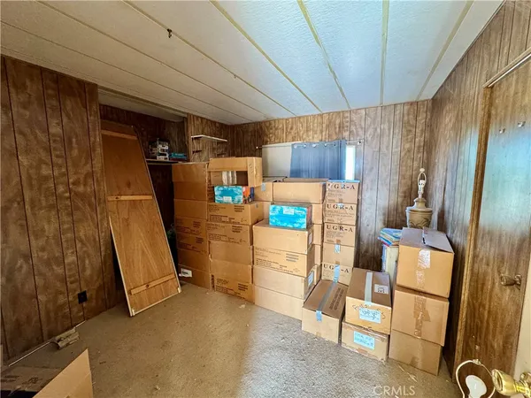 a view of a red door and chair
