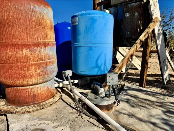 a view of building with a snow on the road