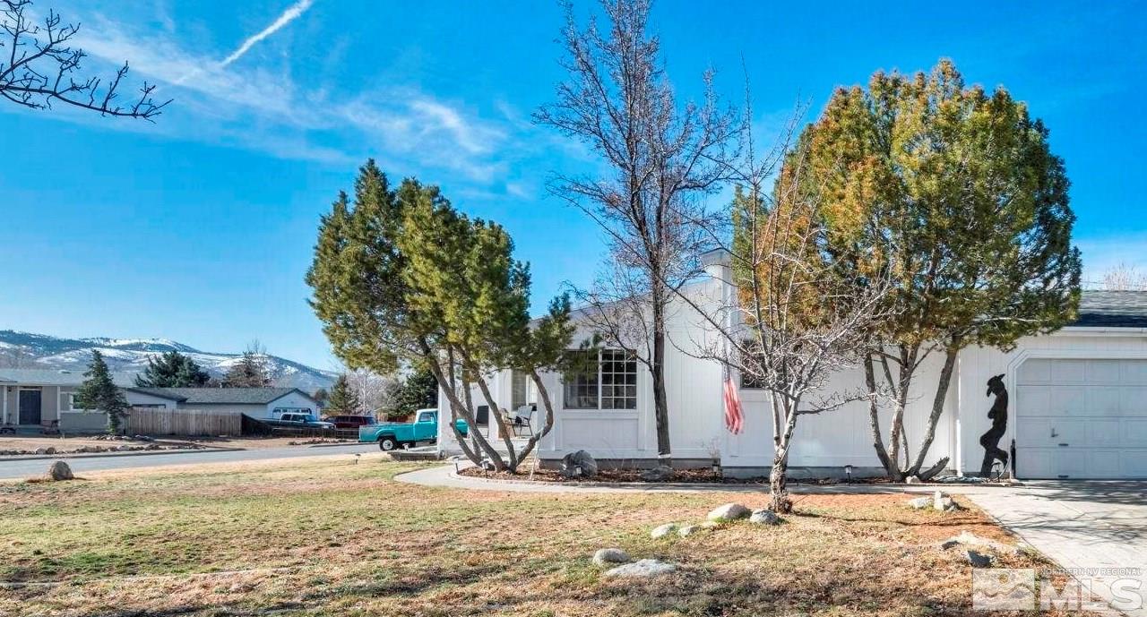 17345 Sunbird Lane Reno, NV 89508 - Photo 1 of 40 a view of a backyard of the house