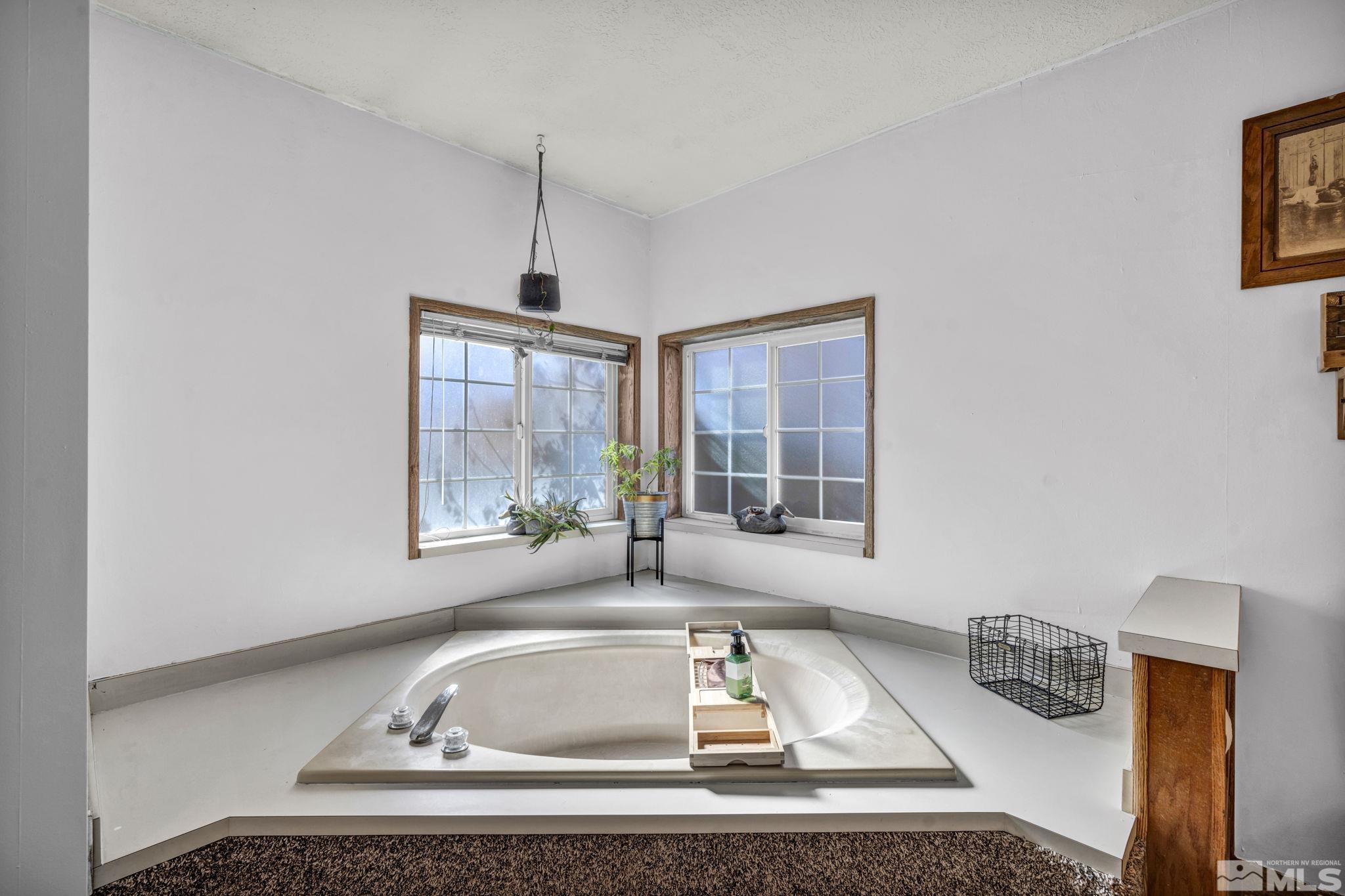 17345 Sunbird Lane Reno, NV 89508 - Photo 22 of 40 a room with a couch and a window