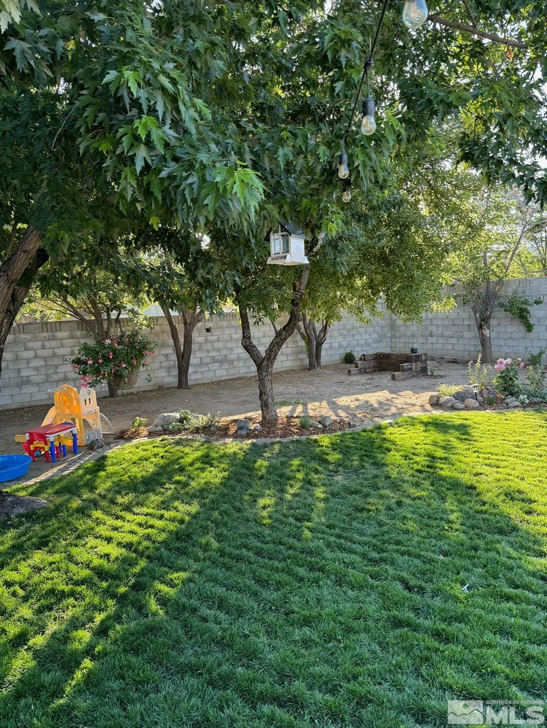 17345 Sunbird Lane Reno, NV 89508 - Photo 30 of 40 a view of a bench in a garden