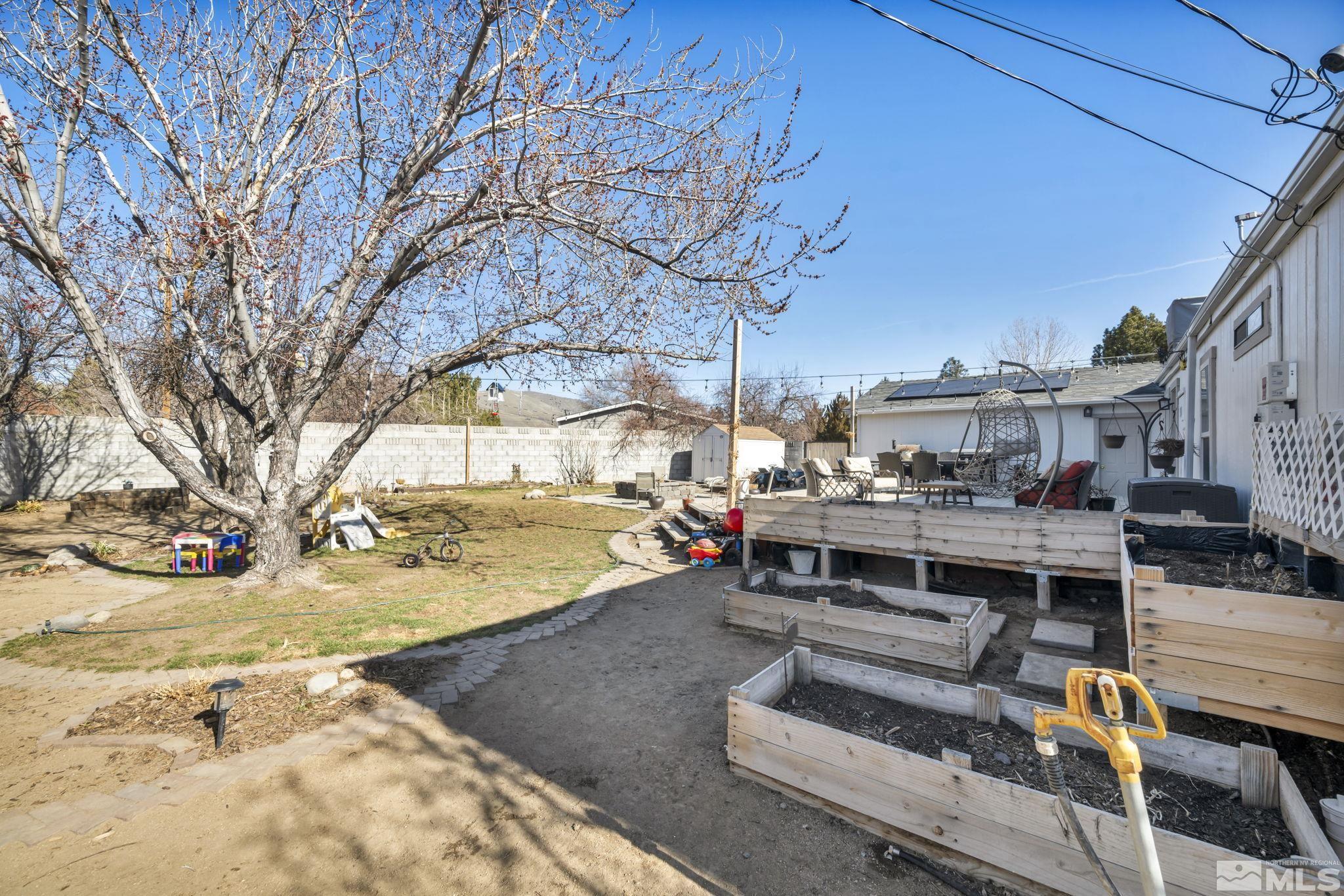 17345 Sunbird Lane Reno, NV 89508 - Photo 33 of 40 a view of a patio with a yard