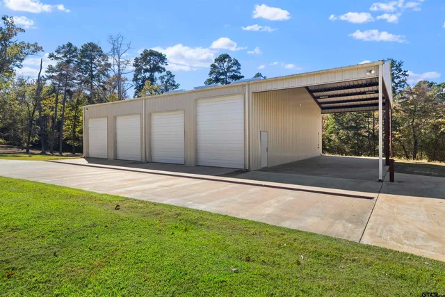a view of a backyard of the house