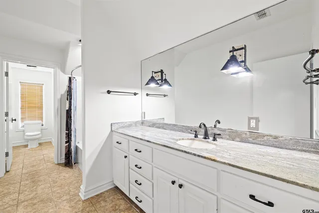 a view of a kitchen counter top space and stainless steel appliances