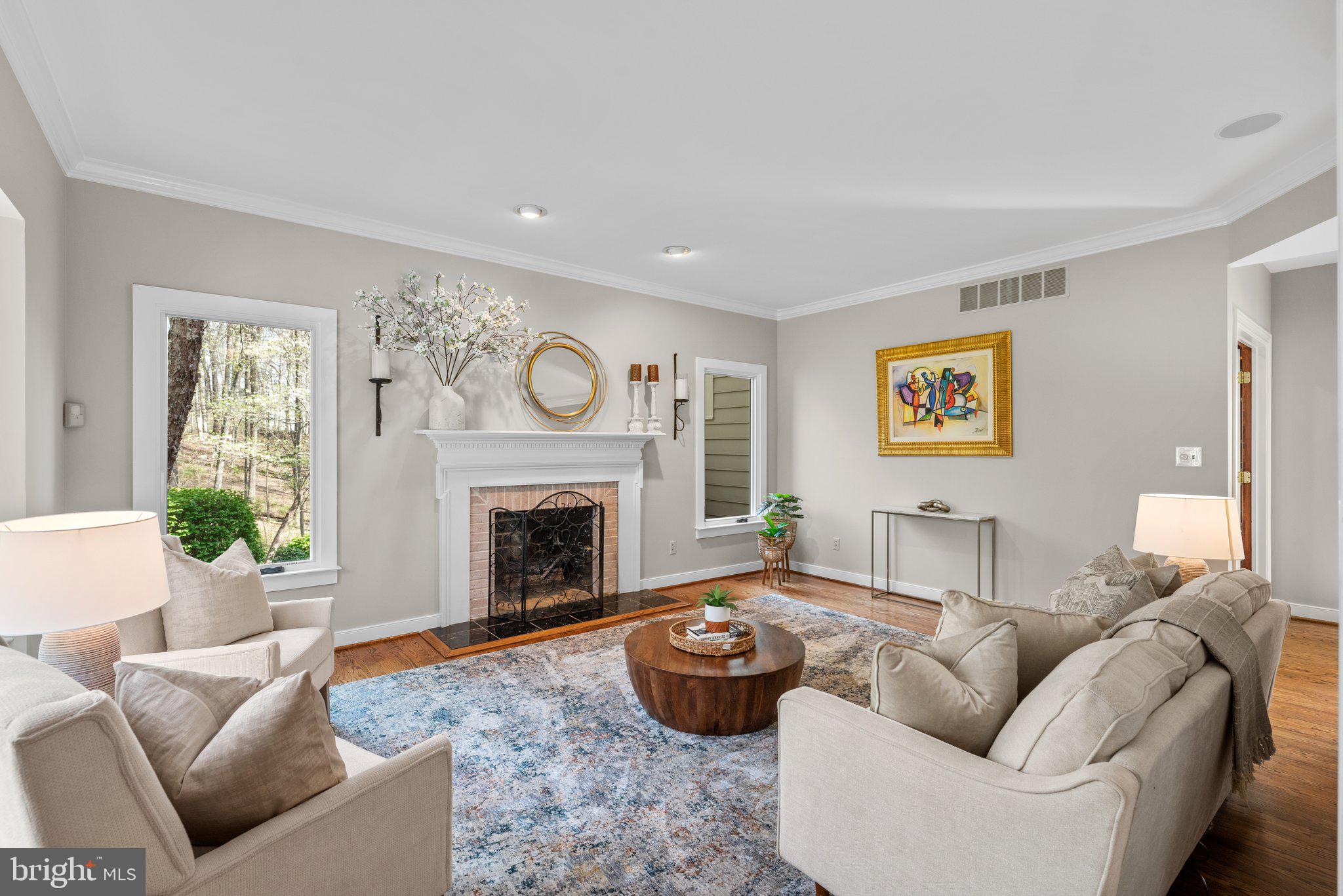 13791 Lakeside Drive Clarksville, MD 21029 - Photo 13 of 90 a living room with furniture and a fireplace