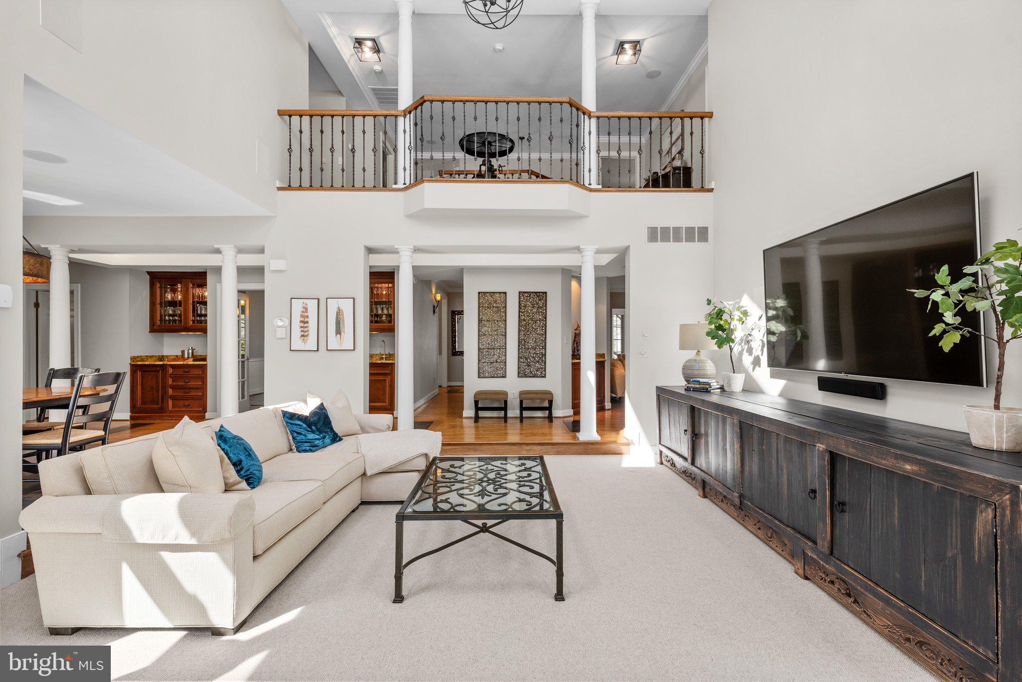 13791 Lakeside Drive Clarksville, MD 21029 - Photo 17 of 90 a living room with furniture and a large window