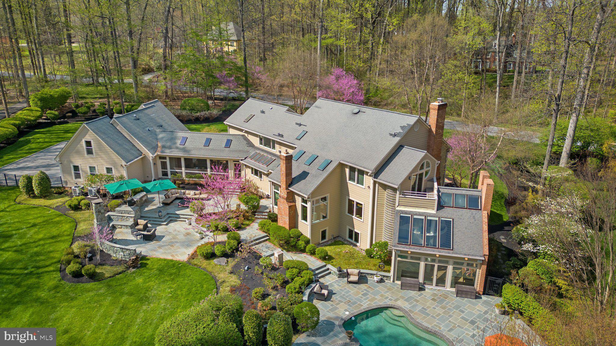 13791 Lakeside Drive Clarksville, MD 21029 - Photo 2 of 90 a aerial view of a house with swimming pool garden and patio