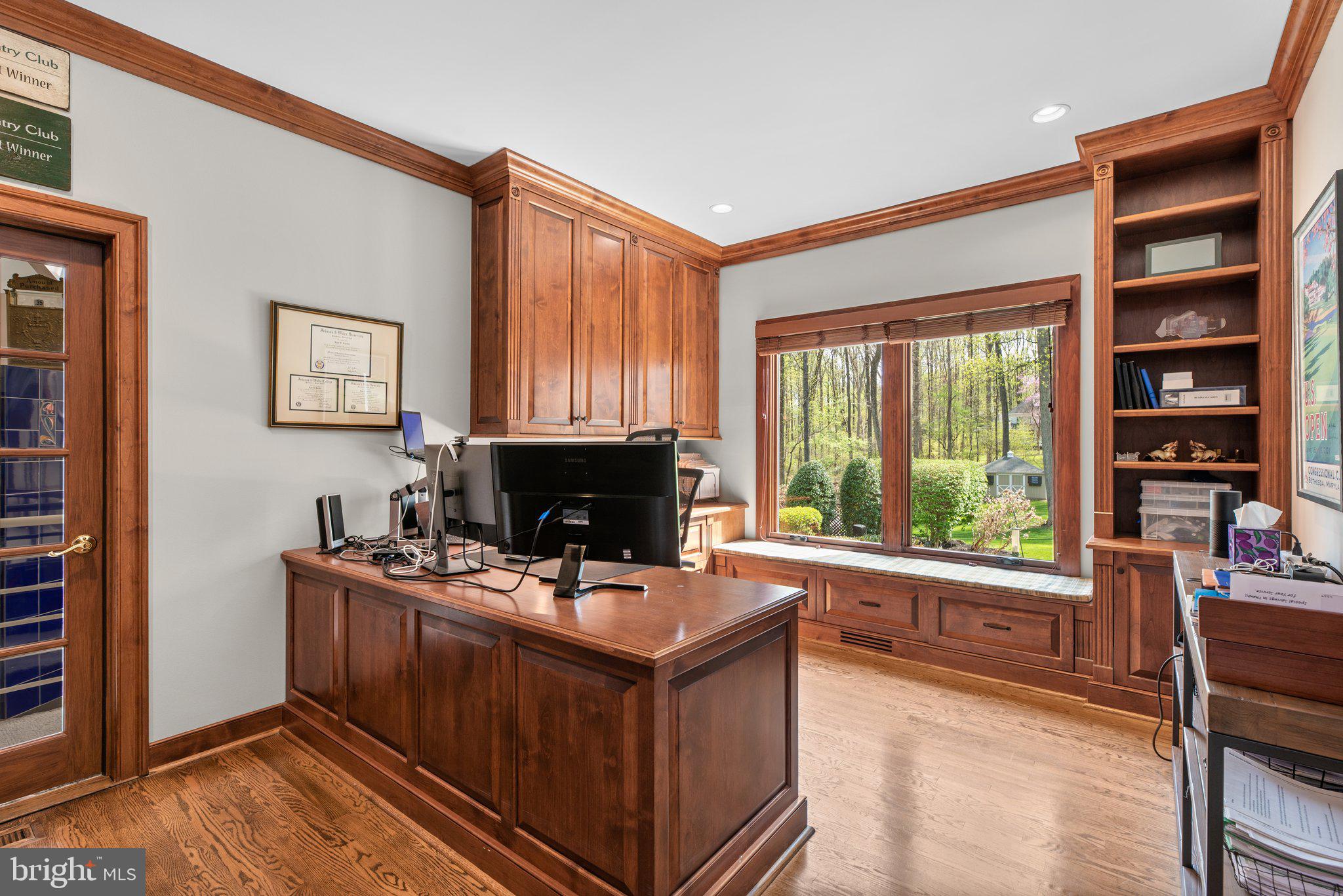 13791 Lakeside Drive Clarksville, MD 21029 - Photo 32 of 90 a living room with furniture a flat screen tv and a fireplace