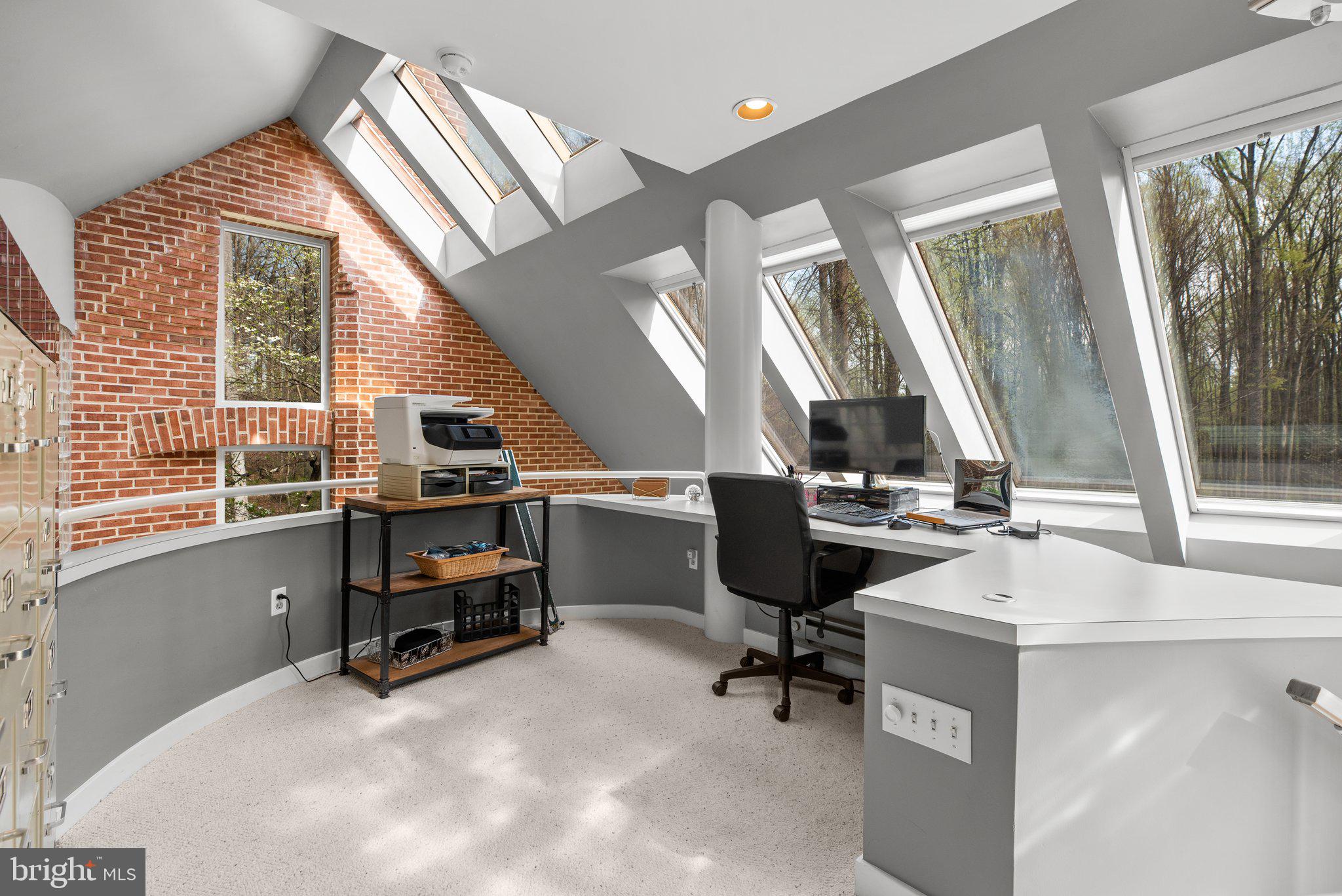 13791 Lakeside Drive Clarksville, MD 21029 - Photo 33 of 90 a view of a workspace with furniture and a window