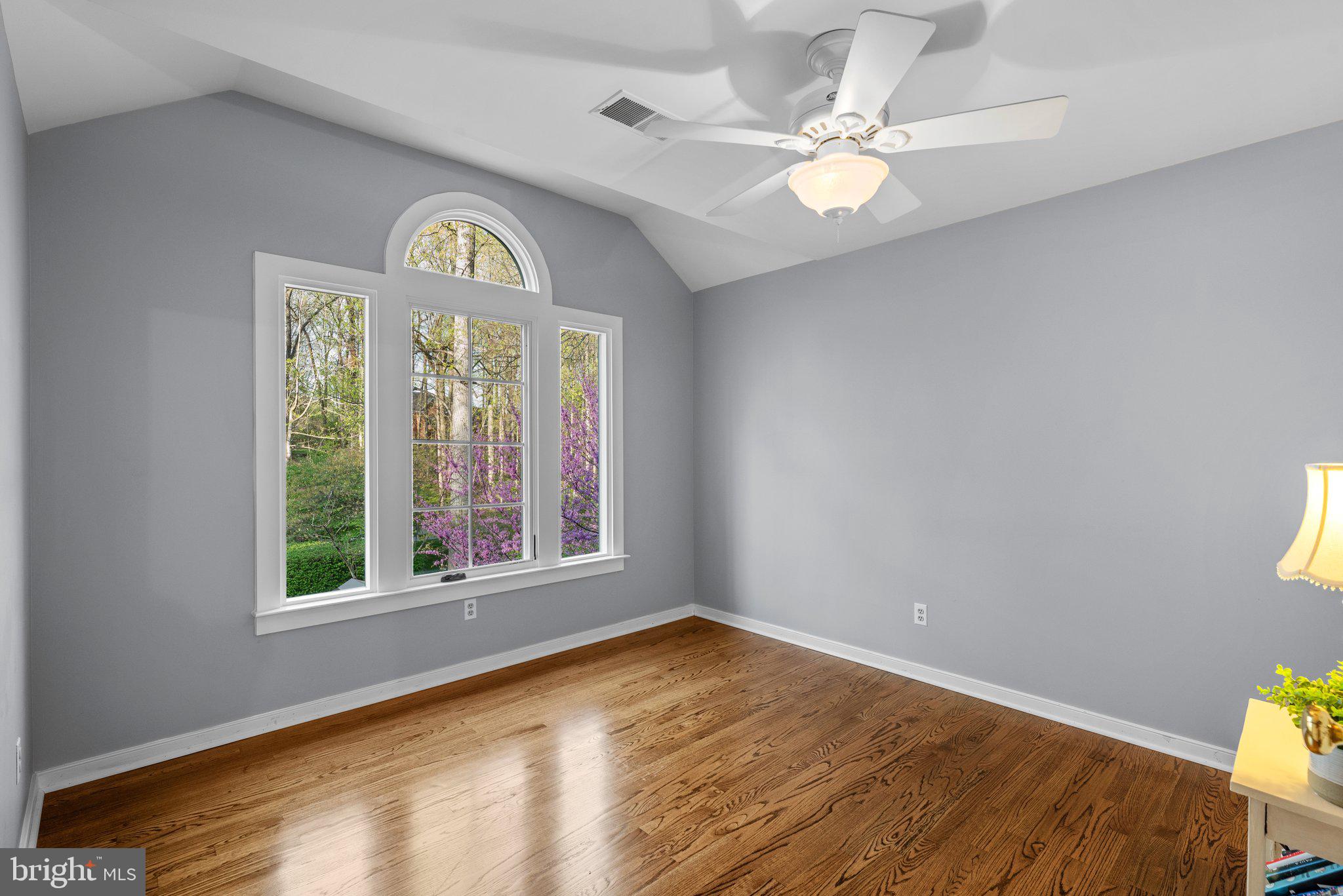 13791 Lakeside Drive Clarksville, MD 21029 - Photo 54 of 90 a view of an empty room with window and wooden floor