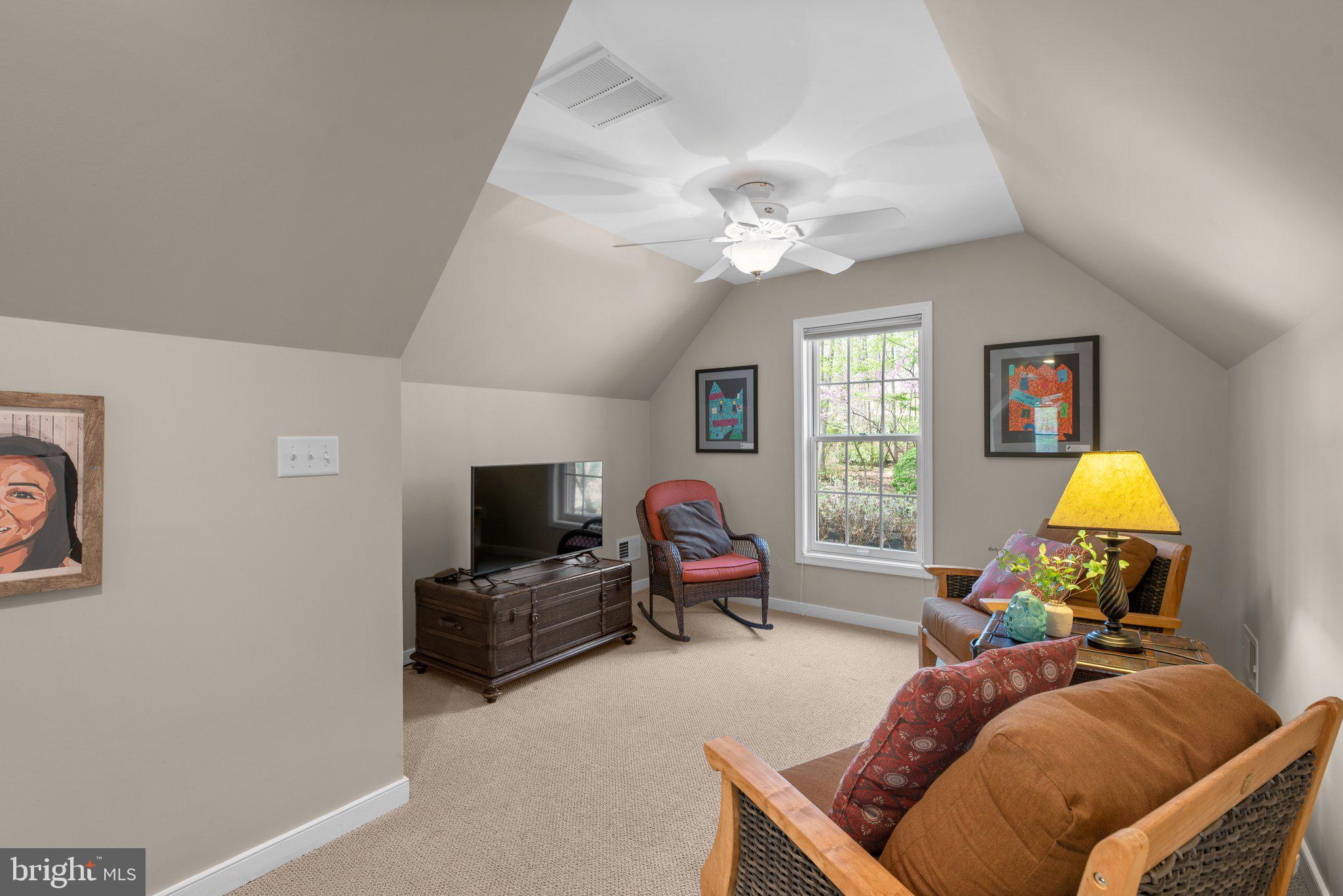 13791 Lakeside Drive Clarksville, MD 21029 - Photo 59 of 90 a living room with furniture and a flat screen tv
