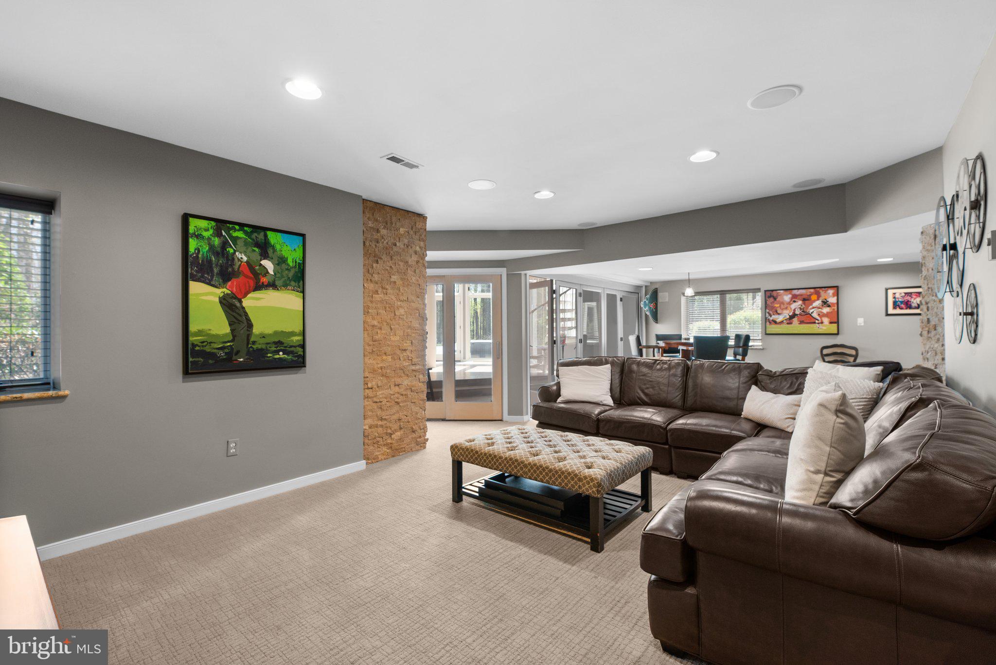13791 Lakeside Drive Clarksville, MD 21029 - Photo 65 of 90 a living room with furniture and a flat screen tv