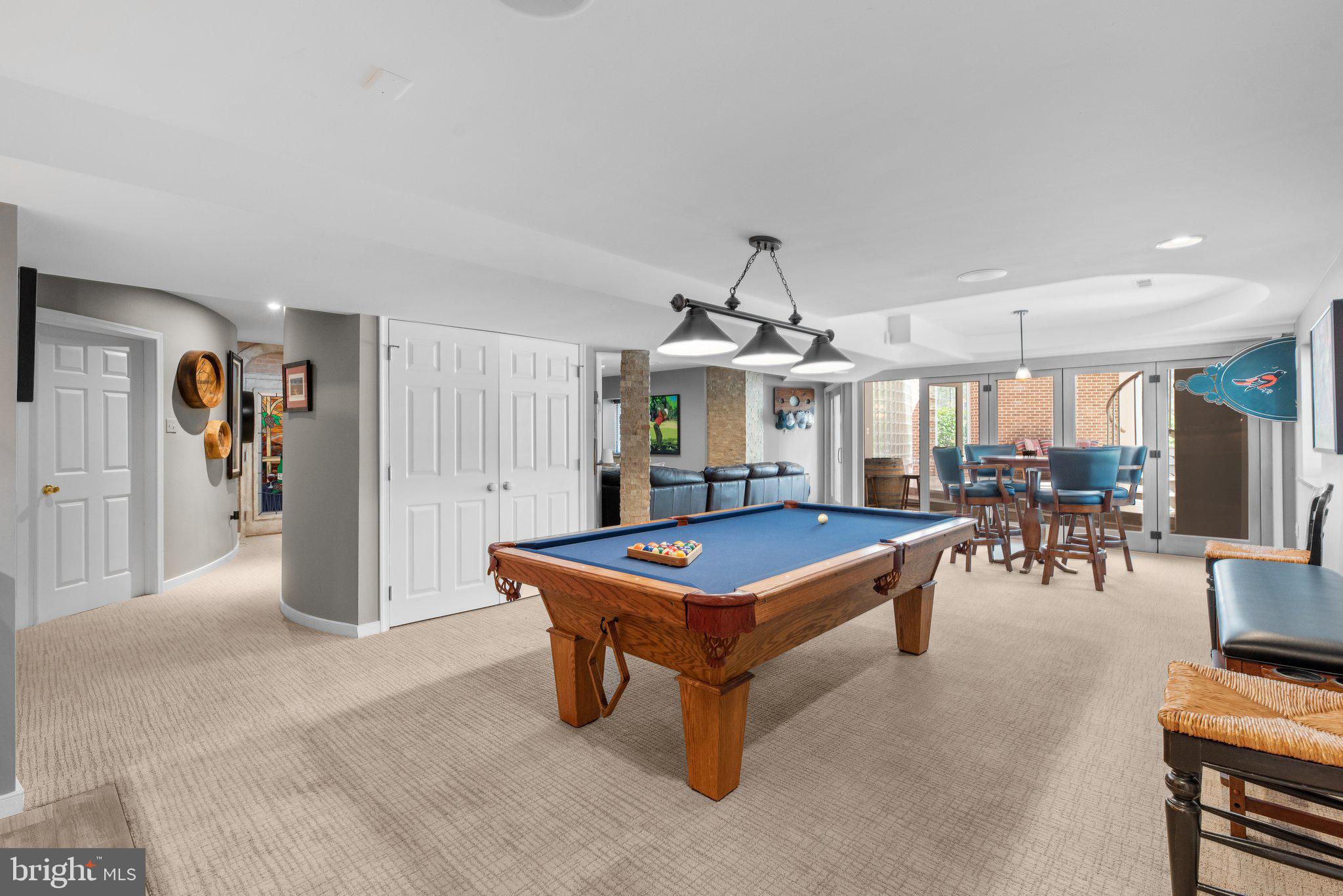 13791 Lakeside Drive Clarksville, MD 21029 - Photo 68 of 90 a living room with furniture a table and kitchen view