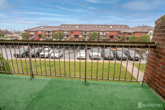 a view of a lake with a building in the background