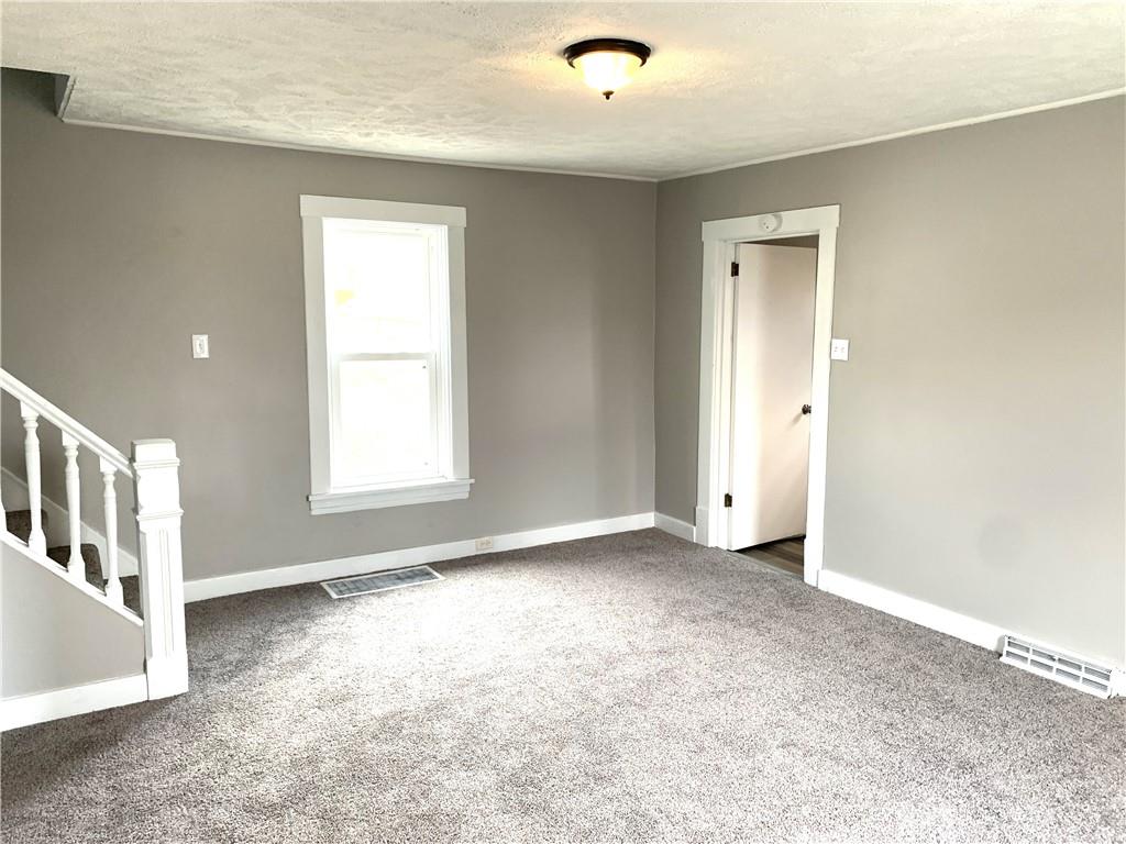 254 Lacock Street Rochester, PA 15074 - Photo 4 of 25 a view of an empty room with a window