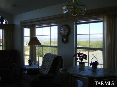 74 Cardinal Corner Benson, AZ 85602 - Photo 16 of 21 a view of a dining room with furniture and window