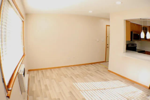 a kitchen with stainless steel appliances granite countertop a sink and a stove