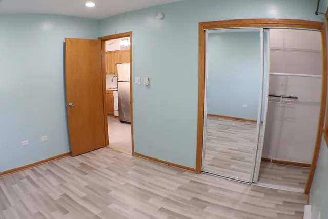a bathroom with sink mirror and toilet