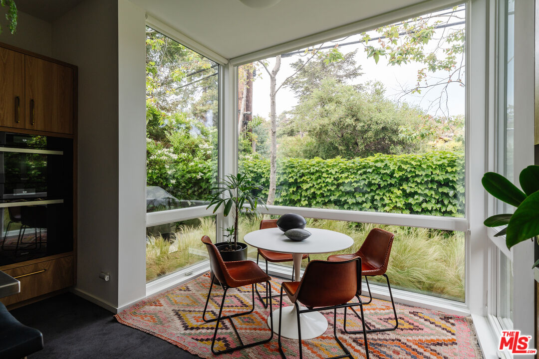 461 West Rustic Road Santa Monica, CA 90402 - Photo 5 of 7 a dining room with furniture and window