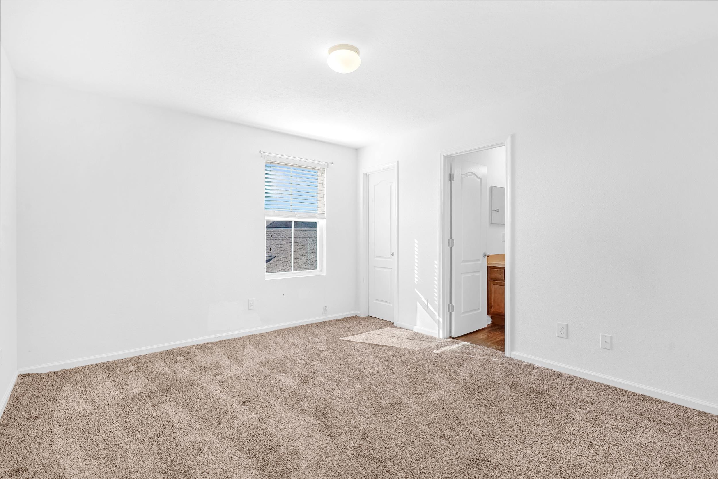 187 Whitland Way St. Augustine, FL 32086 - Photo 15 of 30 an empty room with a natural light