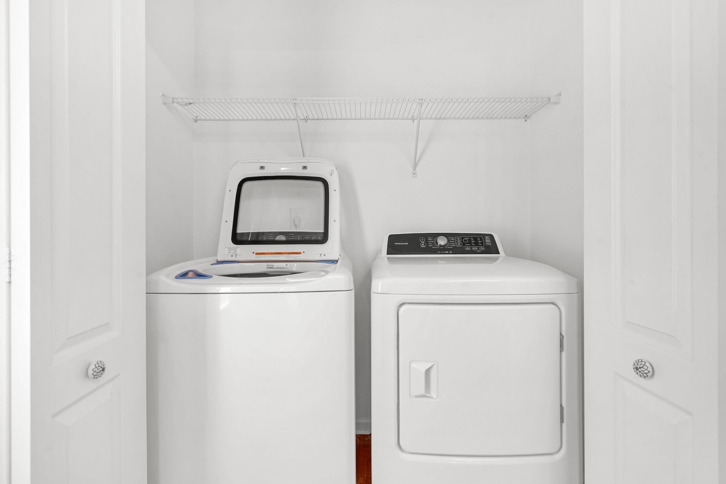 187 Whitland Way St. Augustine, FL 32086 - Photo 18 of 30 a utility room with dryer and washer