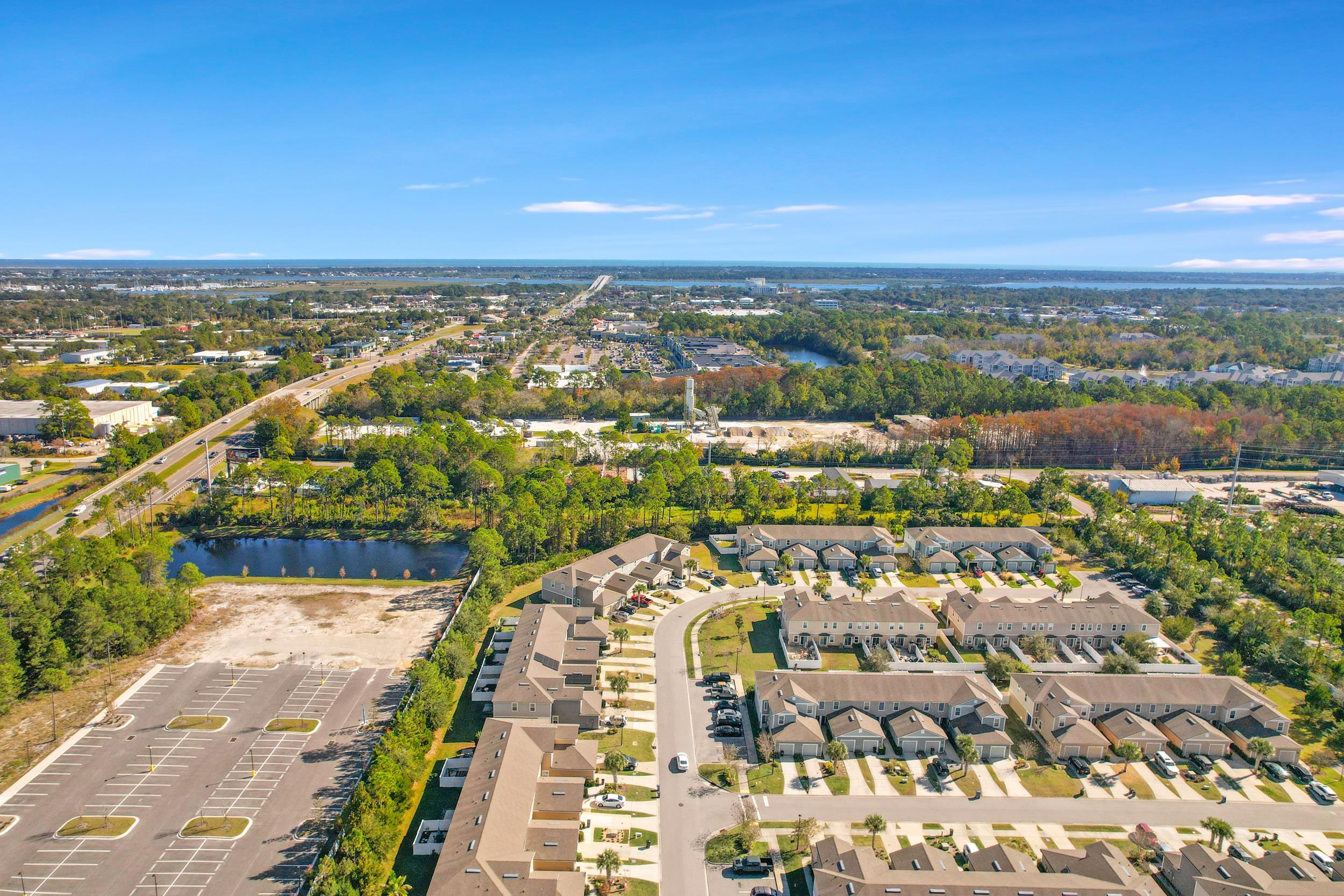 187 Whitland Way St. Augustine, FL 32086 - Photo 25 of 30 an aerial view of a city with houses